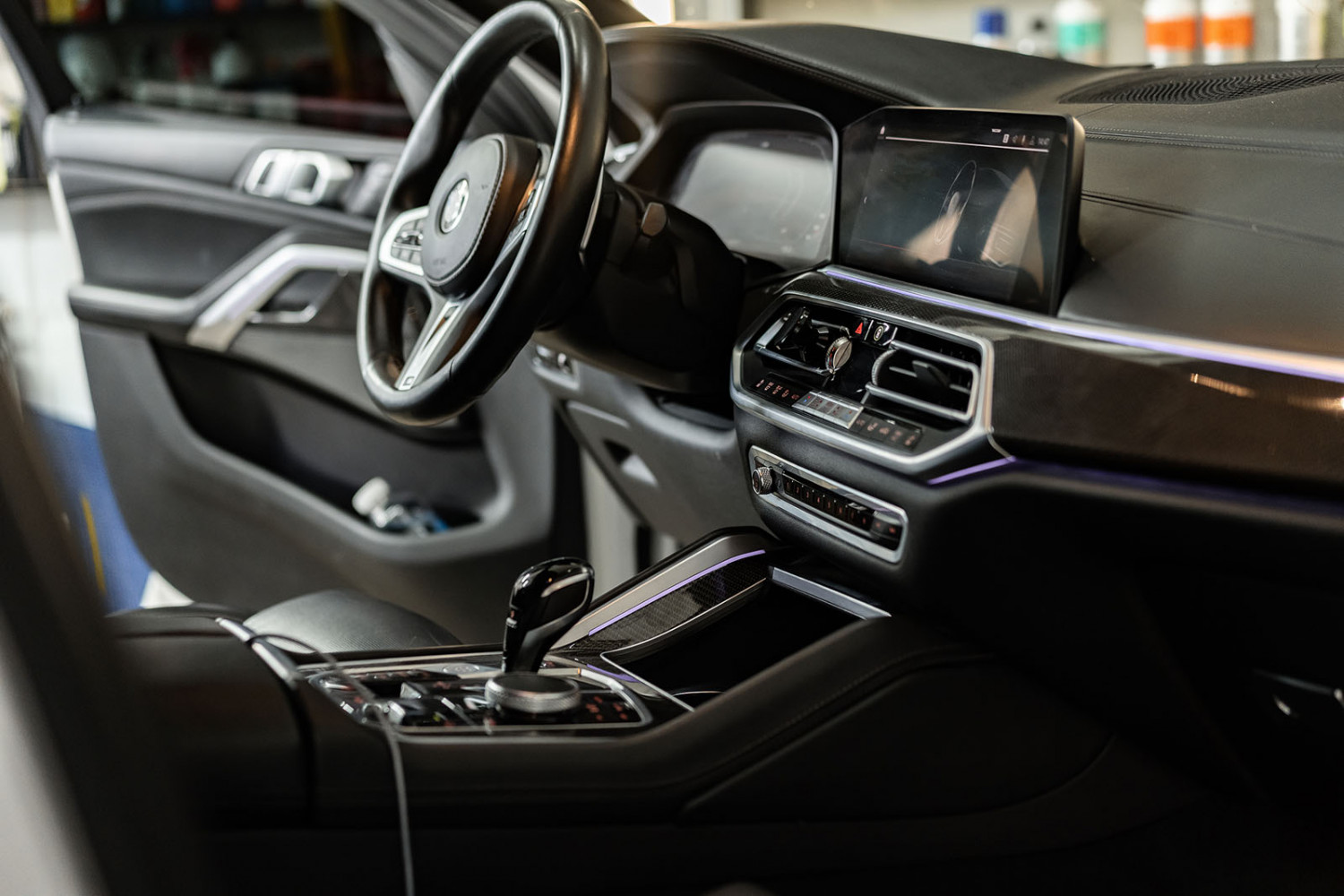 Freshly detailed luxury SUV interior with clean leather and trim